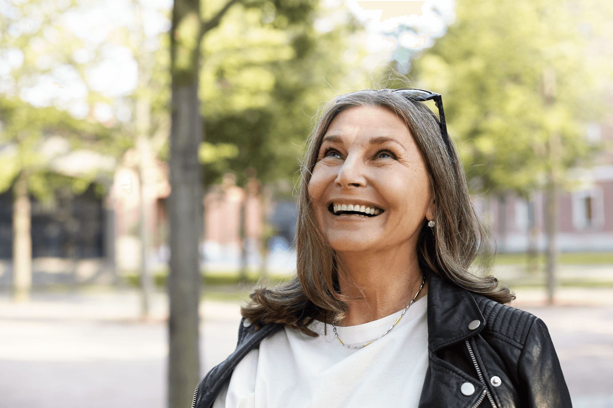 Woman smiling confidently outdoors